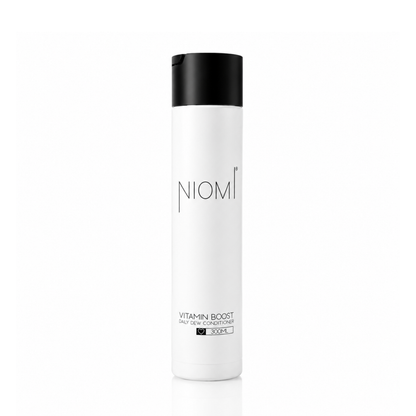 A 300ml white bottle of NIOMI Vitamin Boost Daily Dew Conditioner with a black cap, centered on a white background.